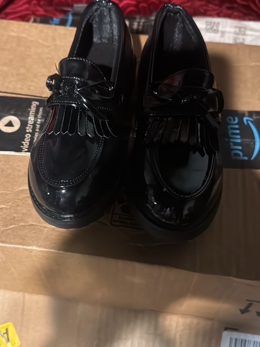 Patent Leather Kiltie Fringe Loafers in Black